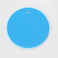 Blue round silicone trivet with honeycomb texture and hanging hole for heat insulation - Blue
