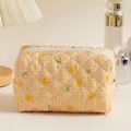 Quilted makeup bag with yellow plaid and smiley face prints featuring top zipper - Yellow Smiley Face