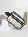 Makro-Aufnahme der schwarzen transparenten PVC-Kosmetiktasche mit goldenen SPF-Patches - Schwarze Tasche (SPF)