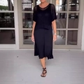 Completo chic a due pezzi in maglia nera con top traforato e gonna coordinata abbinata - Taglia S / Nero