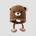 Detailed view of plush teddy bear earflap hat with soft fleece and cute paw print straps - 3-8 Years Old / Brown