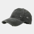 Detailed close-up of distressed charcoal baseball cap with frayed edges and ripped holes - Army Green