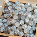 Blue gold-dusted glass beads with cracked texture in a wooden tray for DIY jewelry - M51# Mist Blue [10MM Water Dyed]