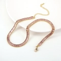 Detail of pink zircon tennis necklace with gold finish and adjustable lobster clasp - Pink