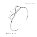 Minimalist silver bow knot open cuff bangle made of high quality stainless steel - Silver