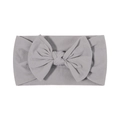 Grey nylon baby headband with a large soft fabric bow on a plain white background - Gray