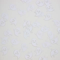 White ghost-shaped Halloween confetti decorations scattered on a plain background surface - White Ghost