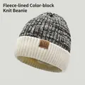 Knit beanie with black-white marl texture and cream ribbed cuff featuring a leather patch - Co Knit Style / White