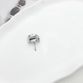 Shiny silver irregular wrinkled metal hair clip with fluid aesthetic on ceramic plate - Fluid Metal Pleated Stud Earrings / Silver #9
