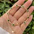 18K gold plated bracelet featuring nine green heart-shaped zircons with lobster clasp - Green