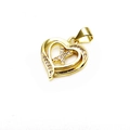 Detail of gold heart pendant featuring a zircon-encrusted cross with metallic luster - Letter X