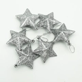 Macro detail of six glittery silver star ornaments for sparkling Christmas tree decoration - 5cm (With Ring) / Silver