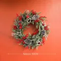 50cm Weihnachtskranz mit roten Beeren, Tannenzapfen und weißen Sternen an orange Wand - Stern & Rote Beeren Kranz 50cm