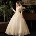 Elegante vestido de novia champán de manga larga con encaje y falda voluminosa - US 26W / Blanco puro