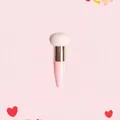 Macro shot of a mushroom head sponge makeup brush with pink handle and silver ferrule - Single Pack / Rose Gold Tube + Light Pink Mushroom Head