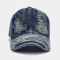 Close-up of heavy distressed ripped details on a dark blue vintage denim baseball cap - Adjustable / Denim Blue