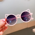 Cute pink cat-ear children's sunglasses with round dark lenses and lightweight frames - Pink