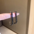 Chic black rectangular geometric earrings with full diamond pavé held by hand - Black Rectangular Silver Earring Post (Full Rhinestones)