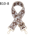 Close-up of vintage ethnic floral jacquard bag strap with gold metal lobster clasps - B10-8/Gold