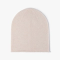 Pink merino wool knitted beanie for women featuring a stylish rolled edge and soft texture - Beige