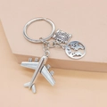 Detailed view of silver travel keychain with airplane, globe, and world city suitcase charms - Landmark Suitcase Globe Airplane Style (5# Large Airplane)