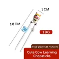 Blue and white cartoon cattle toddler training chopsticks made of ABS and silicone - Cow Training Chopsticks (Opp Bag)