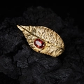 Leaf design S925 silver ring with red garnet gemstone on black stone background - Ring / Gold / Garnet