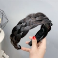 Detailed view of black fishtail braid headband showing realistic synthetic hair texture - Fishbone Braid / Natural Black