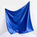 Detail of a 90cm blue satin silk scarf showing soft folds and glossy fabric texture - 90*90cm / Sapphire Blue