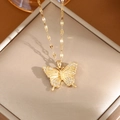 Elegant gold butterfly necklace with sparkling zircon wings on premium jewelry box - A0117 Gold White CZ Butterfly
