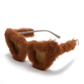 Brown heart-shaped sunglasses with faux fur frame shown in a 45-degree angle view - Brown