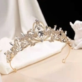 Golden baroque bridal crown featuring sparkling white crystals on a white silk background - No.1 KC Gold (White Stone)