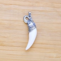 Wolf tooth pendant necklace with silver ram head carving and durable wax cord - Elephant Head Style Pendant