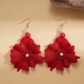 Detail of red flower earrings with gold hooks, featuring matte petals and glossy pearls - Flower Drop Earrings / Red