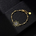 Detail of gold beaded chain bracelet featuring a blue star-shaped evil eye charm - Style 13 (Blue Star)