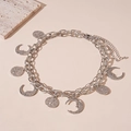 Detail view of double-layered silver necklace with bohemian sun and moon celestial pendants - Silver (2PCS Set)