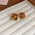 Detailed close-up of tiger eye stud earrings in gold twisted metal frame on a tray - Silver Needle / Gold Brown Square Amber Style (9#)