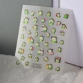 Detalle de pegatinas 5D para uñas de dinosaurios con diseños de dibujos animados y texturas - Estilo Gato Dinosaurio (TS-276)