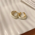 Detailed shot of French pearl heart flower earrings on white ceramic tray - No.4 Ear Clip - White