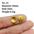 Macro shot of 10mm golden hollow flower bead cap spacers for DIY jewelry making - No.15 (Dia 10mm/Hole 2mm)