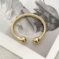 Minimalistische open gedraaide kabelarmband van 18k verguld roestvrij staal - Goud