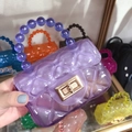 Detail of purple transparent jelly bag with quilted texture and beaded handle - Transparent Purple