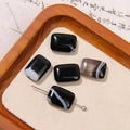 Five rectangular black and white striped natural agate beads on a zen display pad - Black White Striped Rectangular Agate Style (44号)