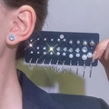 Detailed set of silver-toned stud earrings with faux pearls and sparkling cubic zirconia - Silver White (8406)