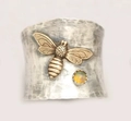 Macro detail of silver hammered ring featuring brass bee and iridescent opal stone - US 6 / Bee Pattern with Opal (KYRA01488)