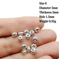 Close-up of a 5mm silver alloy spacer bead for DIY jewelry making on a finger - 6# (Diameter 5mm/Bead Cap)