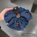 Denim blue knitted scrunchie with cherry embroidery and white pearls on display card - 20cm / Dark Blue