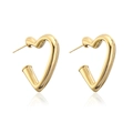 Boucles d'oreilles cœur plaquées or 18 carats polies sur fond blanc avec reflets nets - Doré