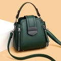 Dark green leather crossbody bag with metal clasp and adjustable shoulder strap - Green