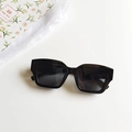 Retro black square frame sunglasses with dark lenses on minimalist white background - Black